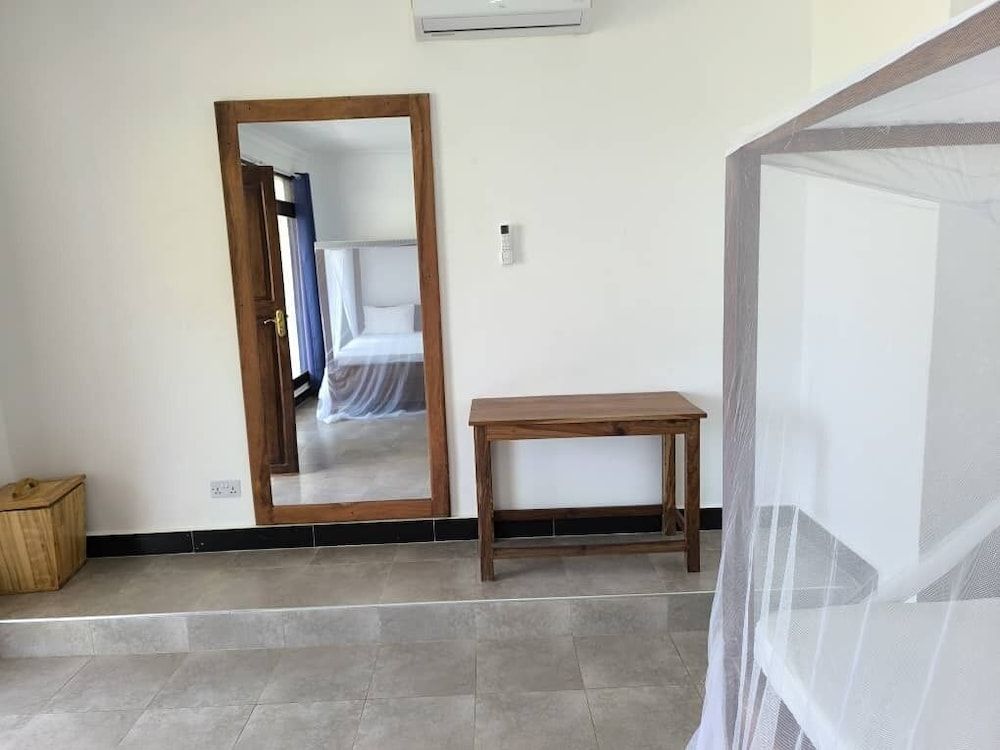 Majani Breeze Standard Twin Room with Balcony and Garden View 9
