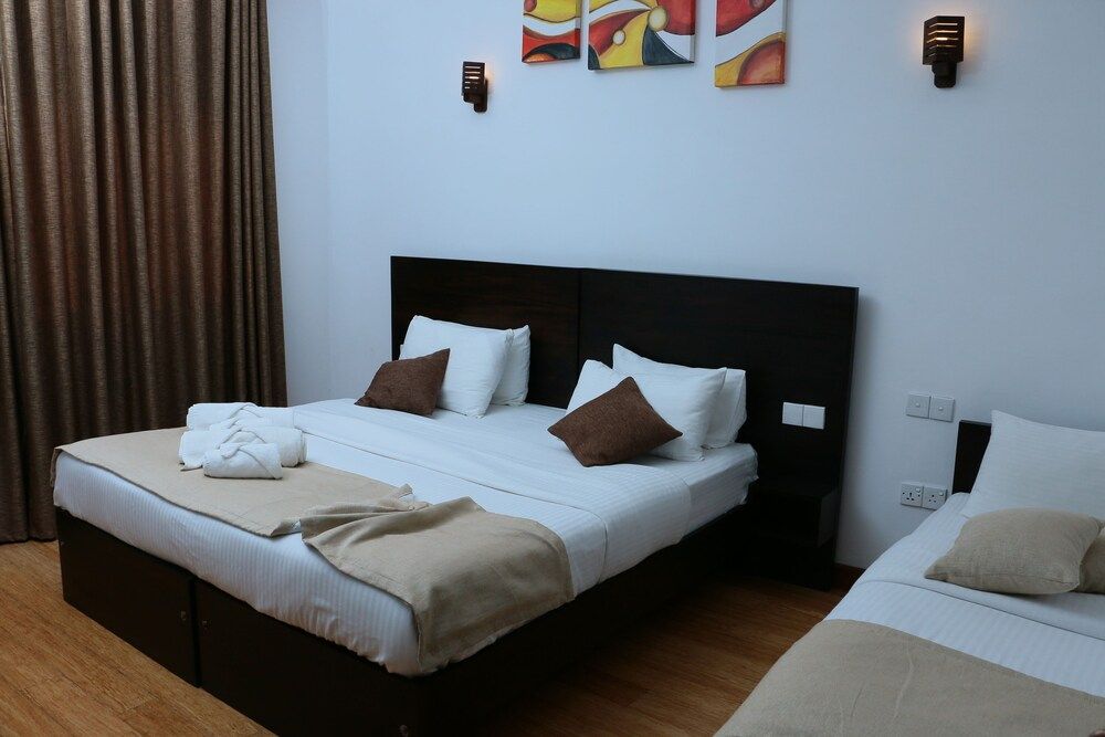 Ruvidee Villa Deluxe Triple Room 2