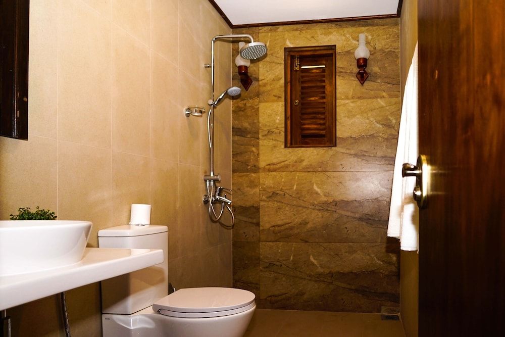 The Ramp Hotel Deluxe Triple Room