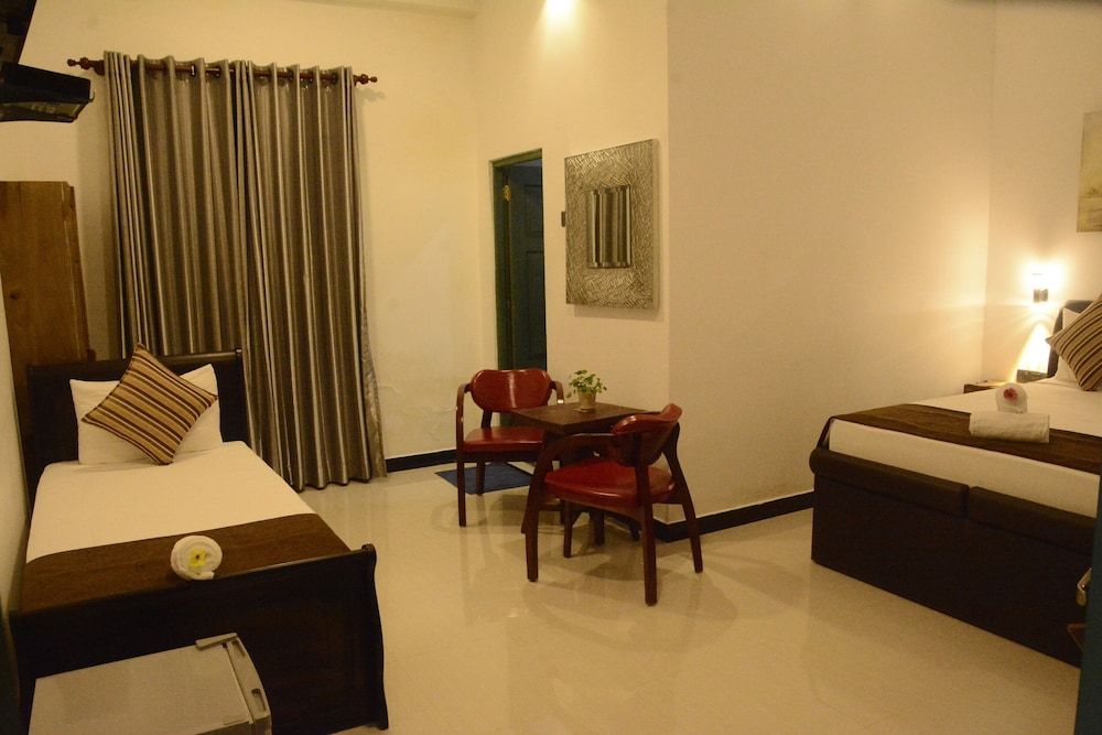 Vimanra Hotel Deluxe Triple Room, 1 Bedroom, Courtyard View 2