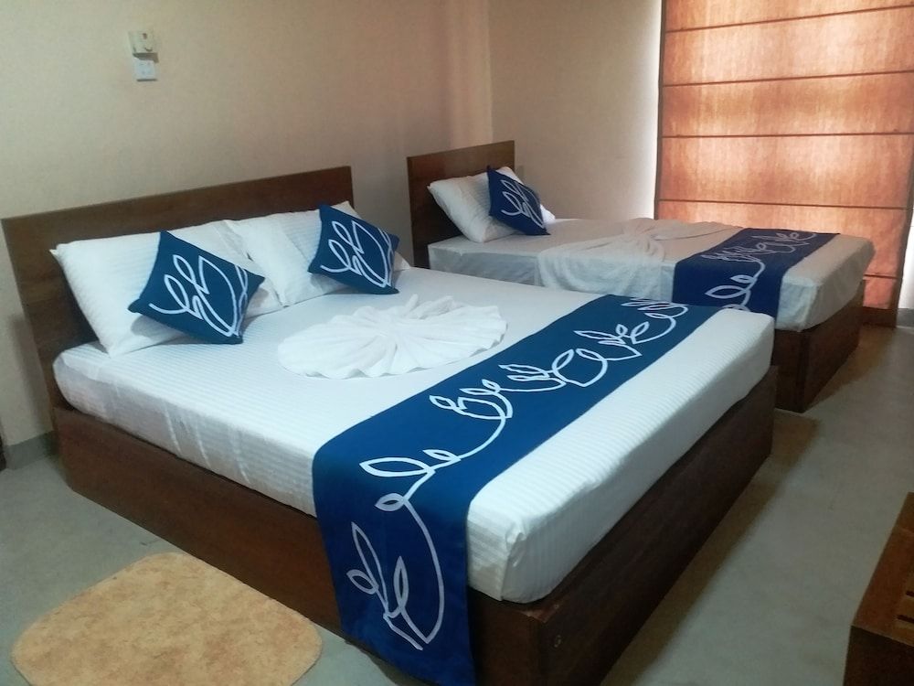 Deluxe Triple Room, Multiple Beds, Non Smoking, Garden View