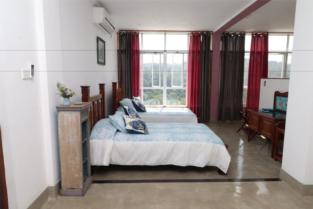 Bougan villa kandy Luxury Quadruple Room 2