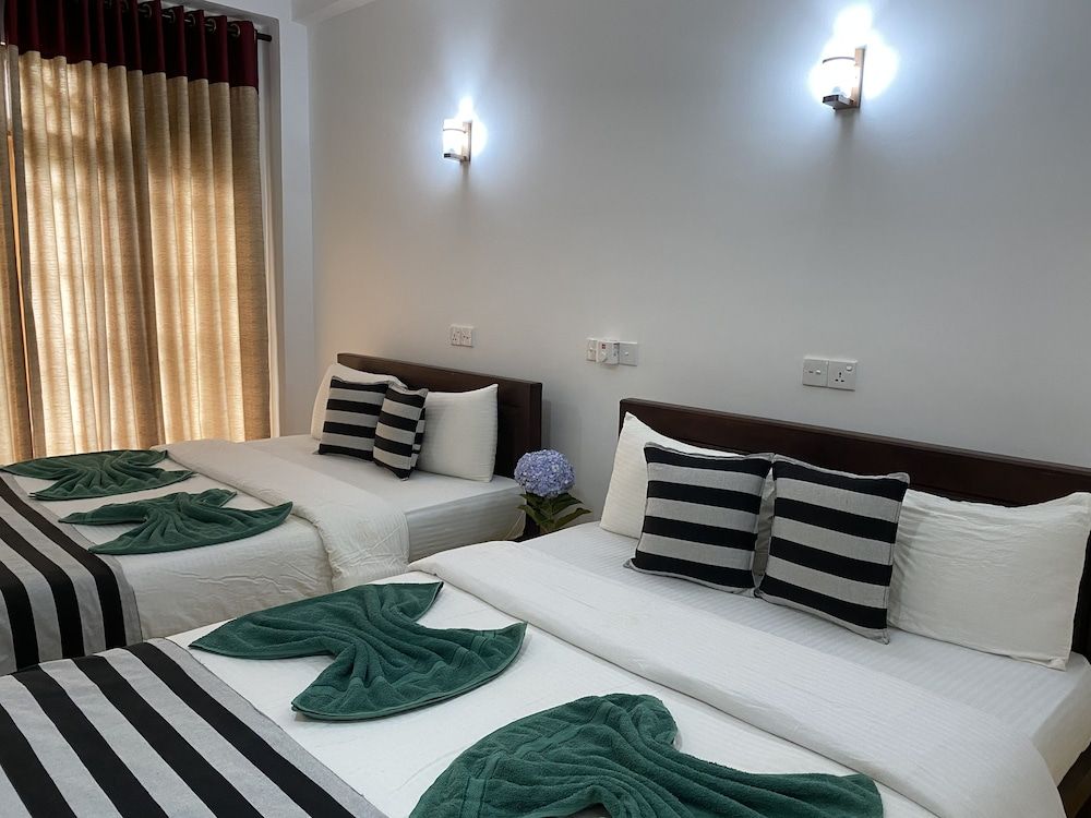 Misty Elegance Ella Deluxe Triple Room