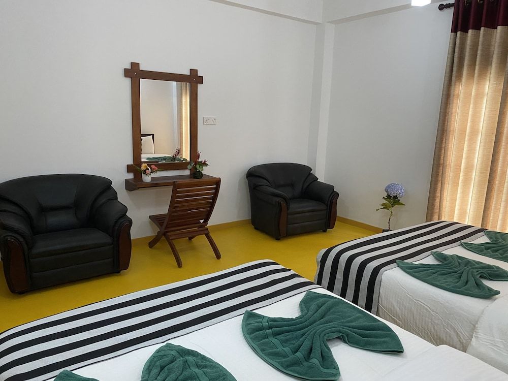 Misty Elegance Ella Deluxe Triple Room 8