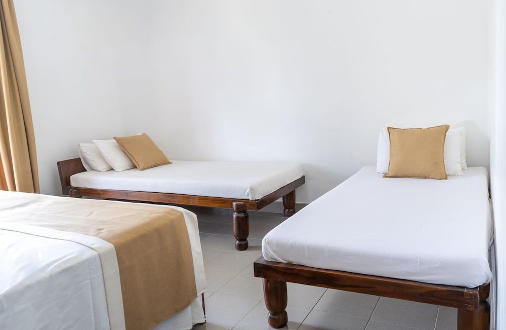 Deluxe Quadruple Room, 1 Bedroom, Balcony, Pool View