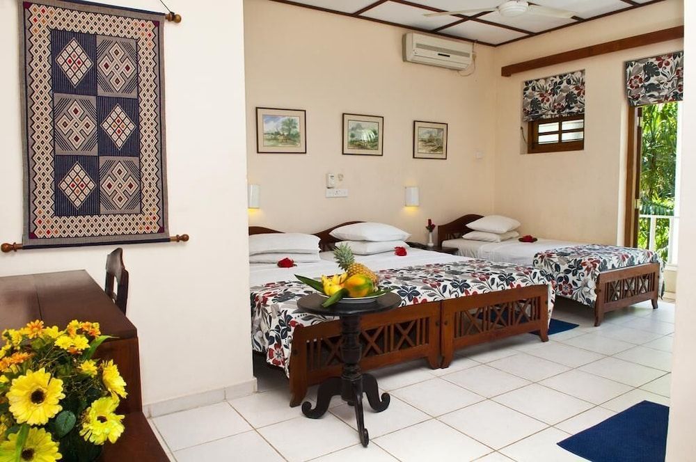 Deluxe Triple Room