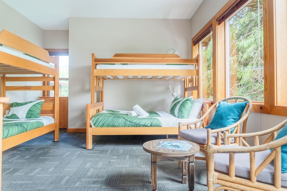 Private room with full bathroom, balcony and cove views
