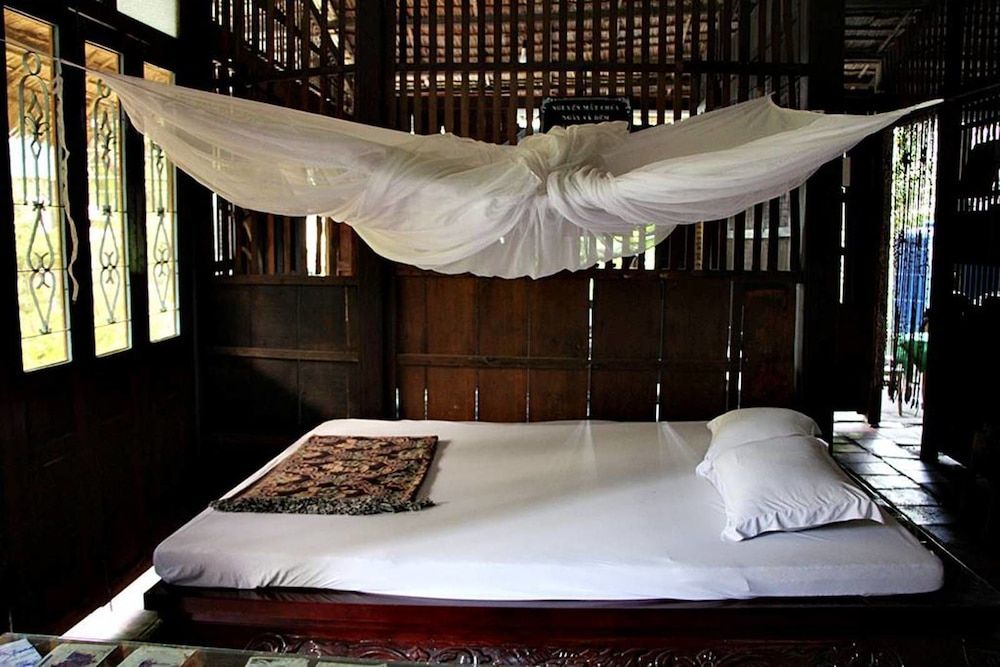 Nhon Thanh Homestay Quadruple Room, Garden View 4