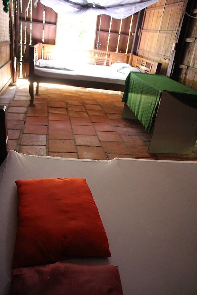 Nhon Thanh Homestay Quadruple Room, Garden View 3