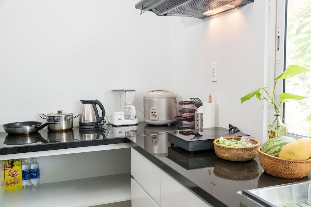 Nanu Garden House Boutique Deluxe Apartment, 2 Queen Beds, Garden View, Beachside 4