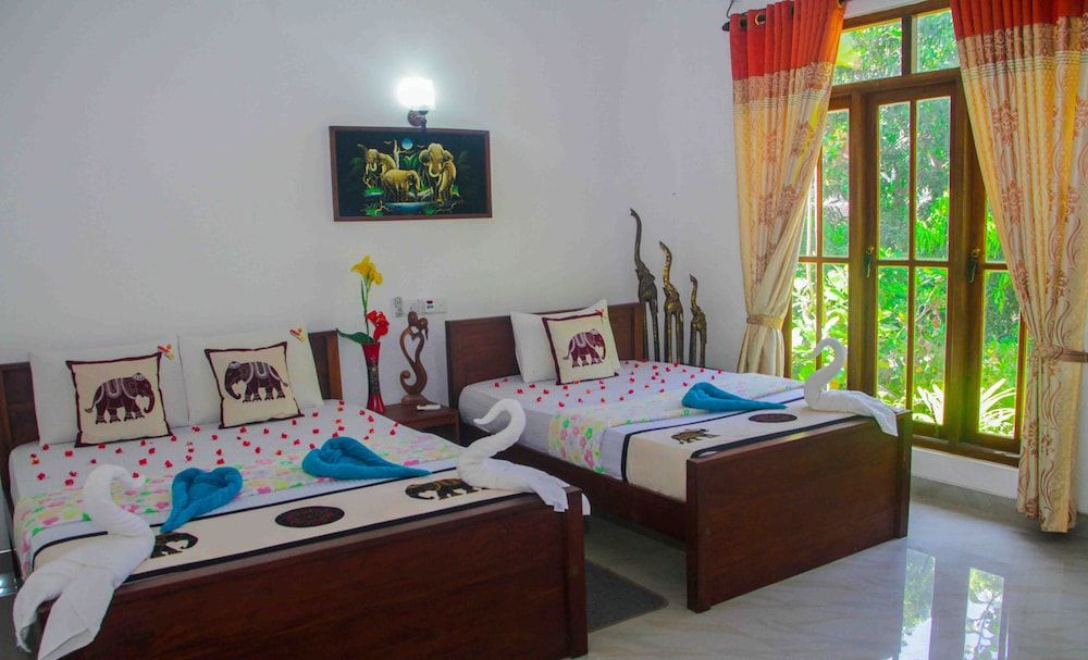 Hungry Lion Sigiriya Standard Triple Room, Multiple Beds 3