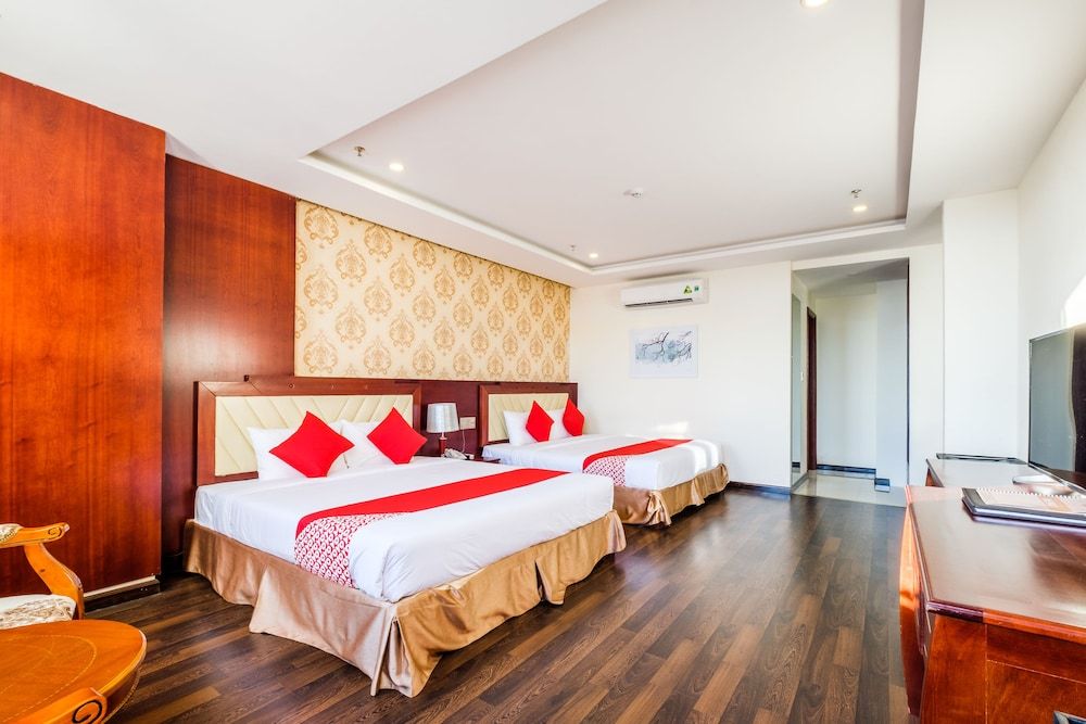 OYO 122 GIC Land Hotel Family Room 4