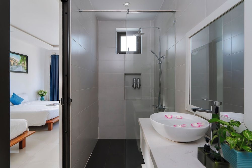 Sunora Villa Hoi An Deluxe Poolside Family Room 4