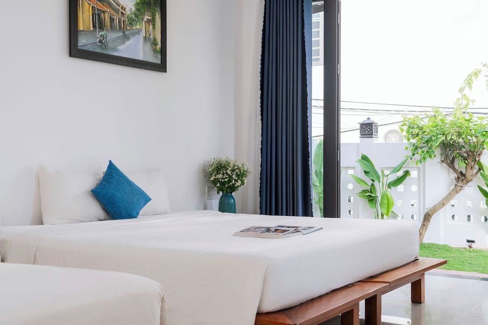 Sunora Villa Hoi An Deluxe Poolside Family Room 2