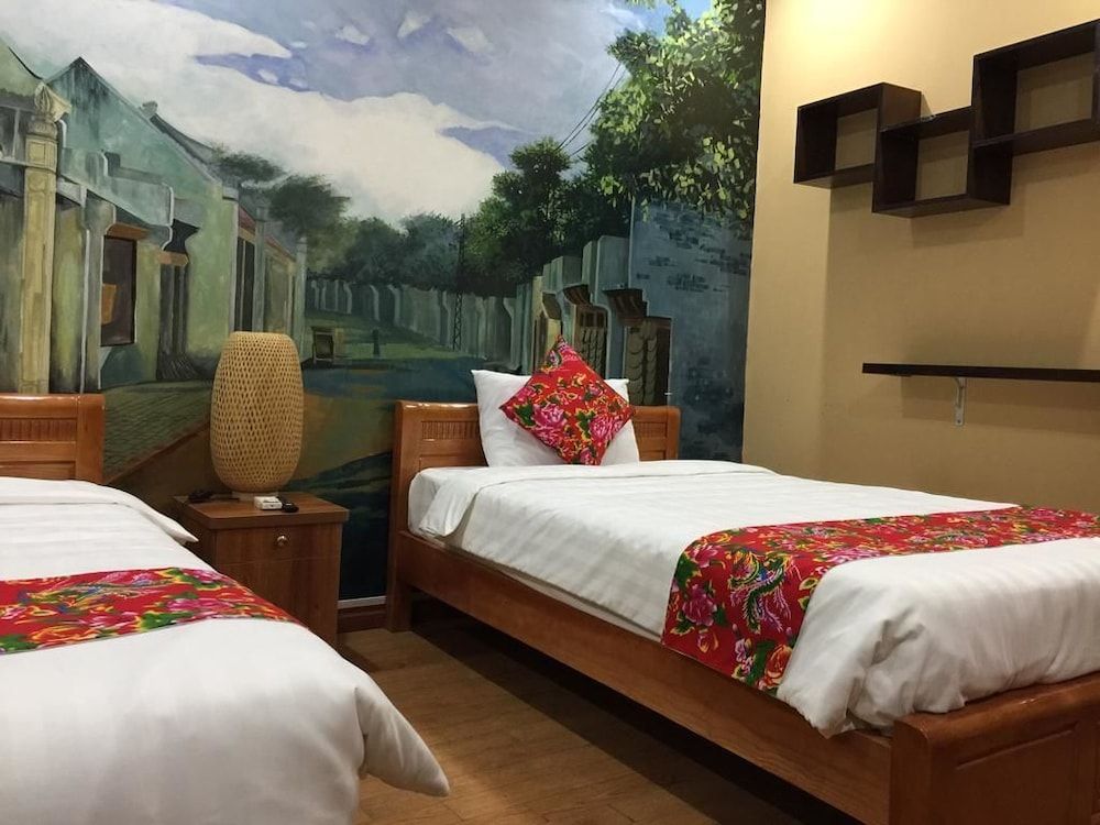Dollar Homestay & Travel Deluxe Triple Room