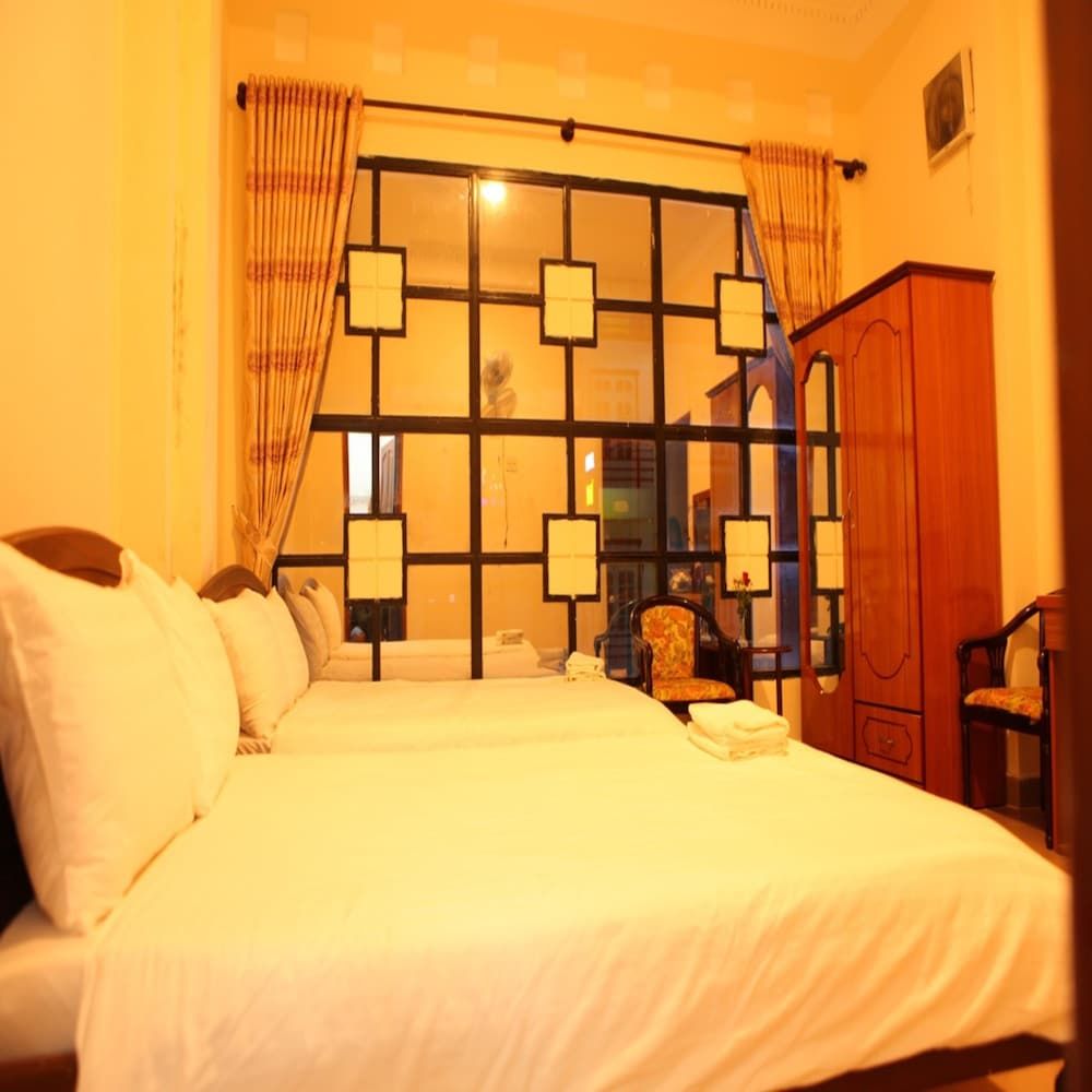 Quang Chien Hotel by Zuzu Quadruple Room 3