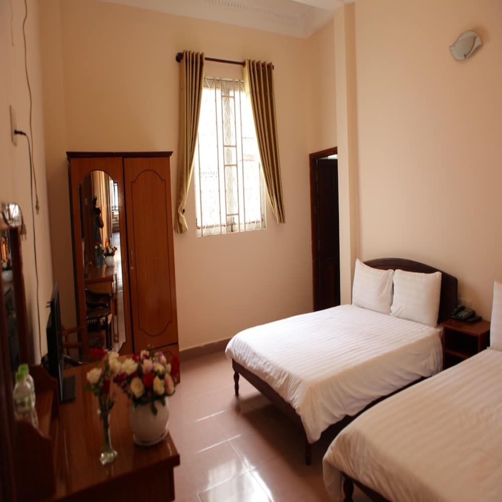 Quang Chien Hotel by Zuzu Quadruple Room 4