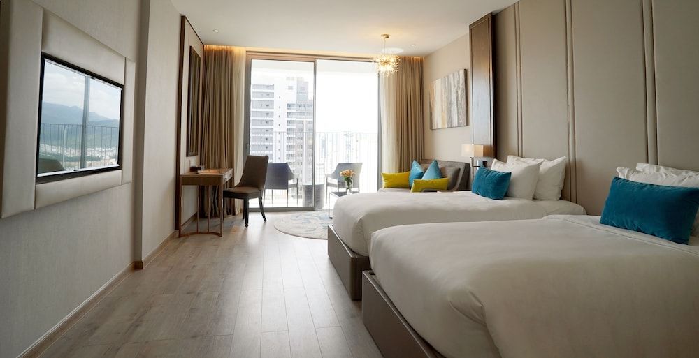 Deluxe Room, Multiple Beds, City View