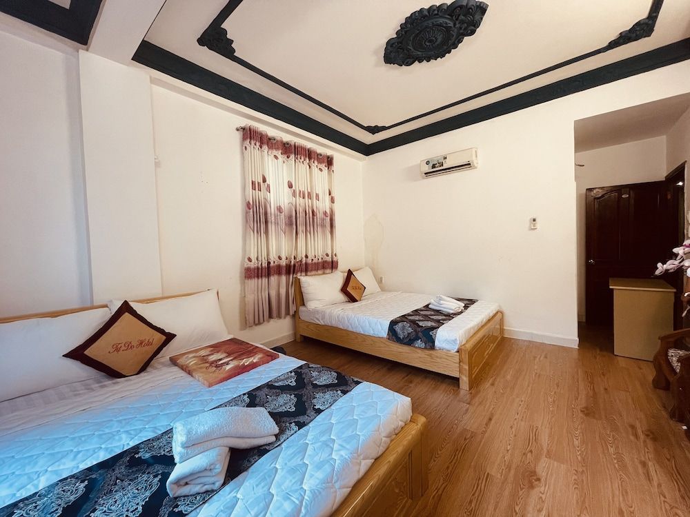 Deluxe Quadruple Room, 2 Queen Beds
