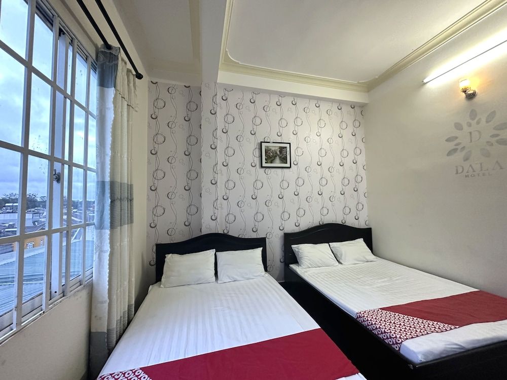 OYO 1172 Tai Loc Hotel Deluxe Room, 2 Double Beds 3