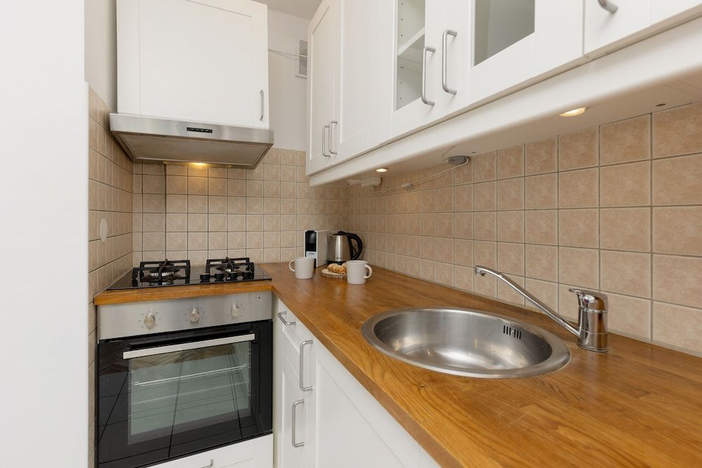 undefined Sunny Studio Warsaw by Renters 6