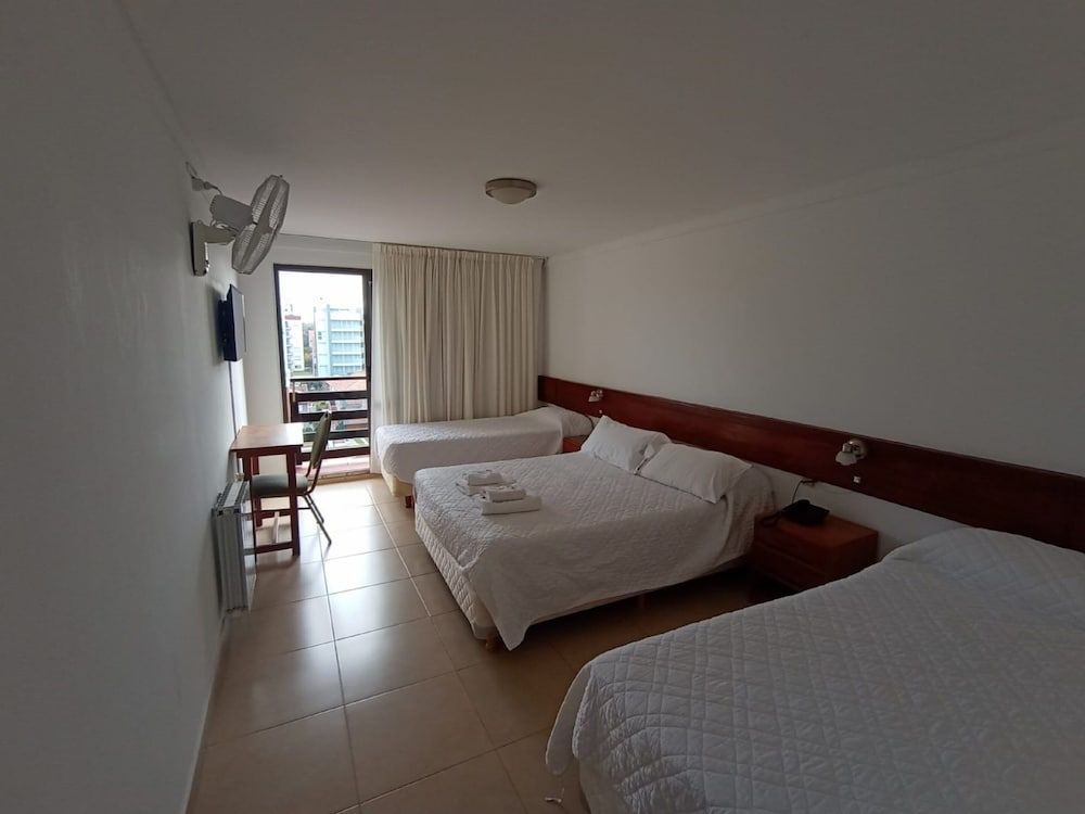 Intersur Villa Gesell Standard Quadruple Room 2
