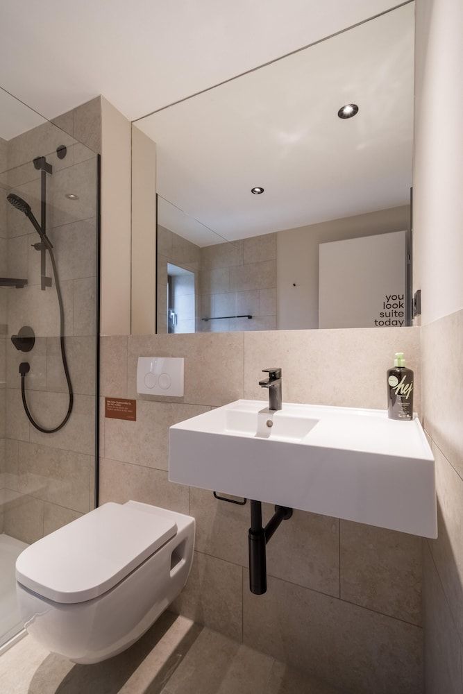 limehome Saarbrücken Berliner Promenade Comfort Suite with sofa bed 9