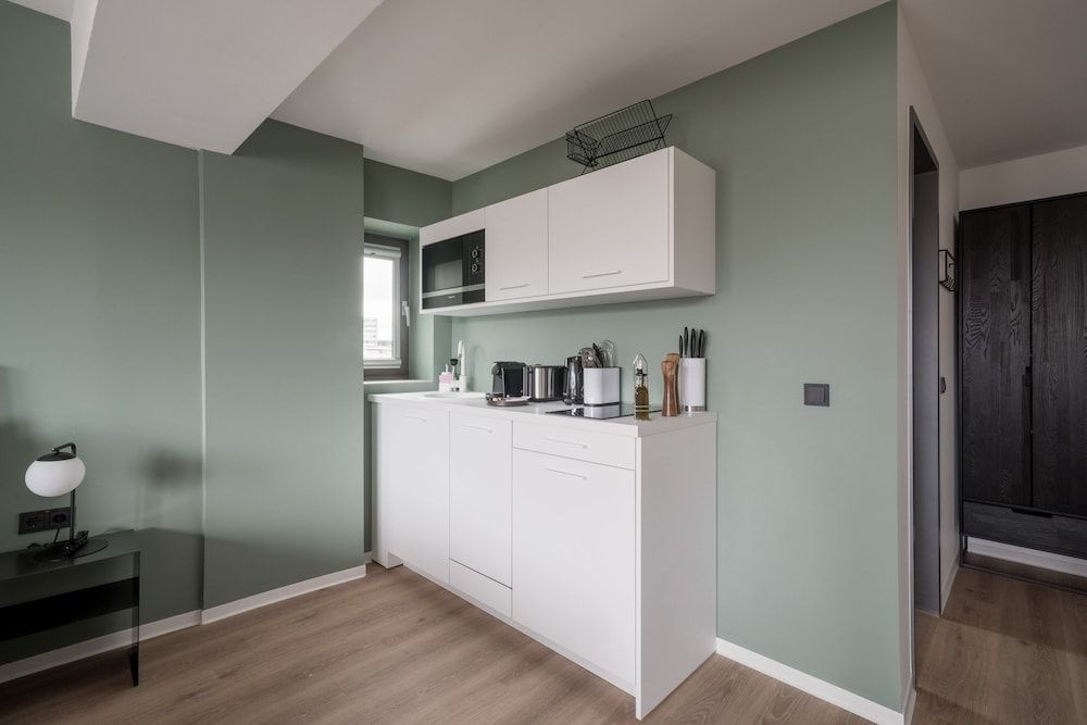 limehome Saarbrücken Berliner Promenade Comfort Suite with sofa bed 11