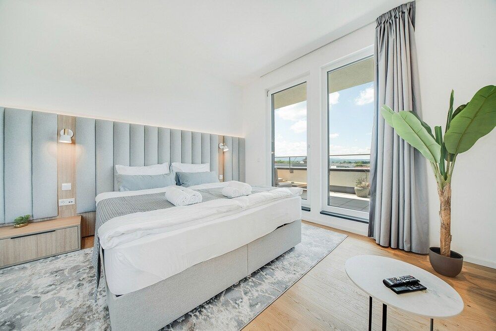 BRIGHT - Rosenheim Aicherpark Penthouse Suite with balcony and terrace.