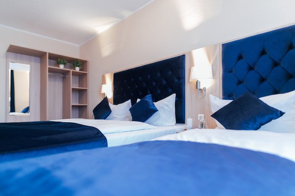 Hotel CULT Hamburg Classic Quadruple Room 3