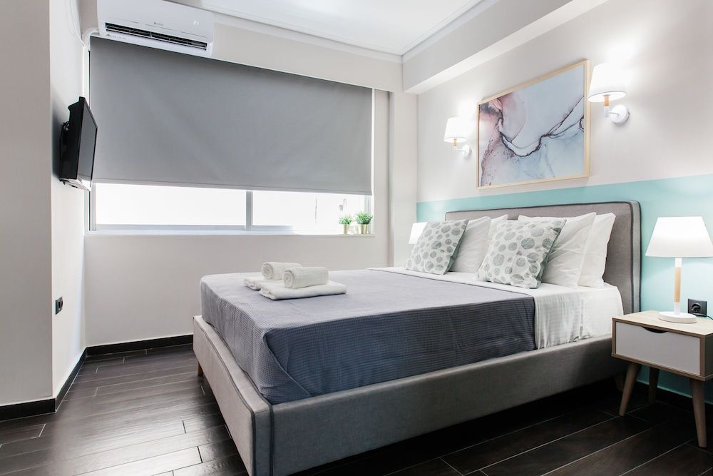 Athenian Downtown Studios by Livin Urbban Deluxe Triple Room 7