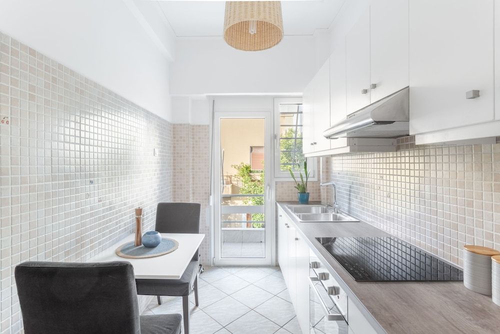 undefined Sun splashed sanctum balconies Acropolis 10