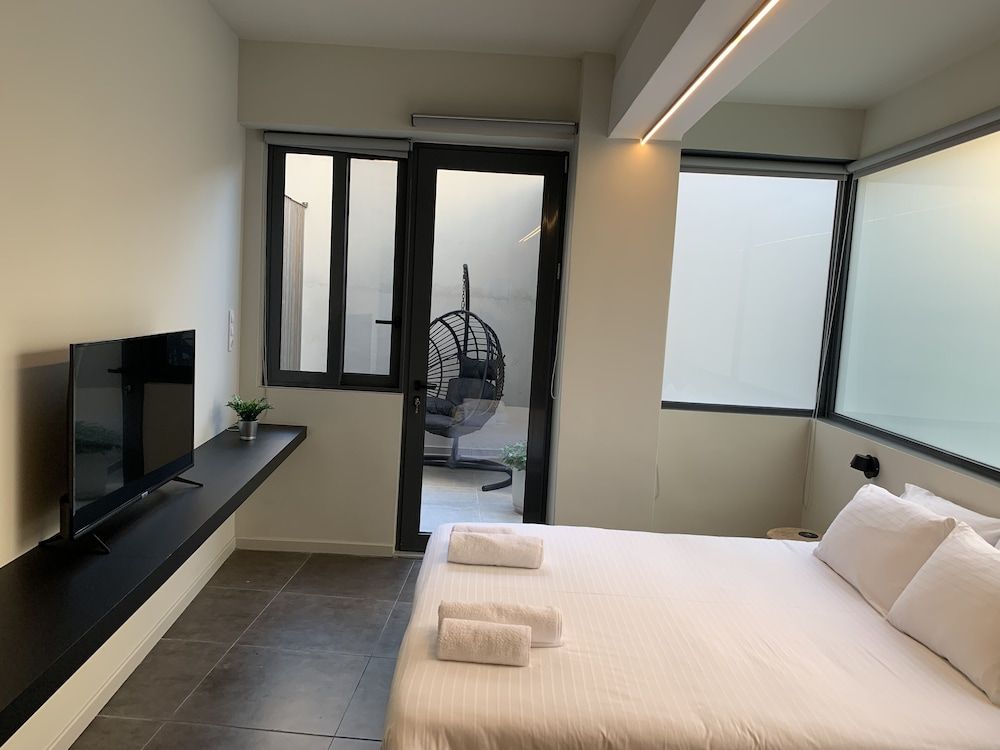 M17 Studios & Suites Deluxe Triple Room 19