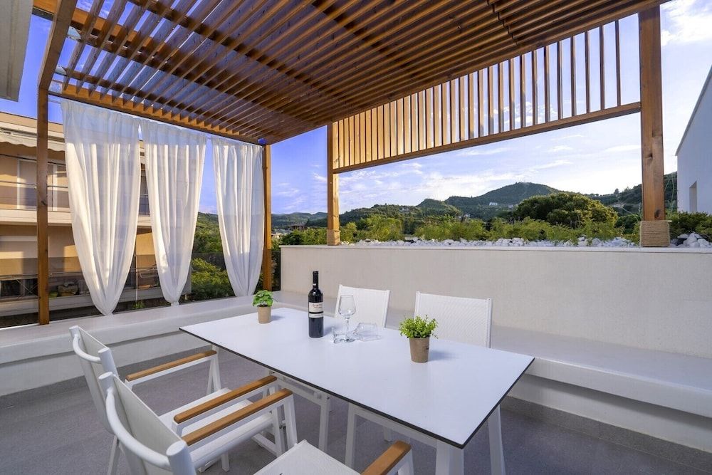 Deluxe Maisonette with Balcony Pool View