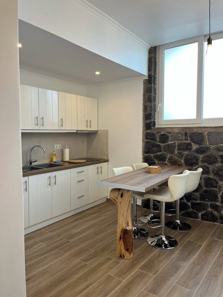 undefined Milesian Suites