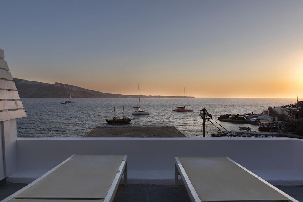 undefined Ammoudi Sunset Cave Santorini