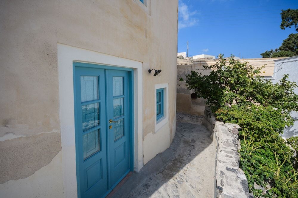 undefined Santorinio Yellow House 7