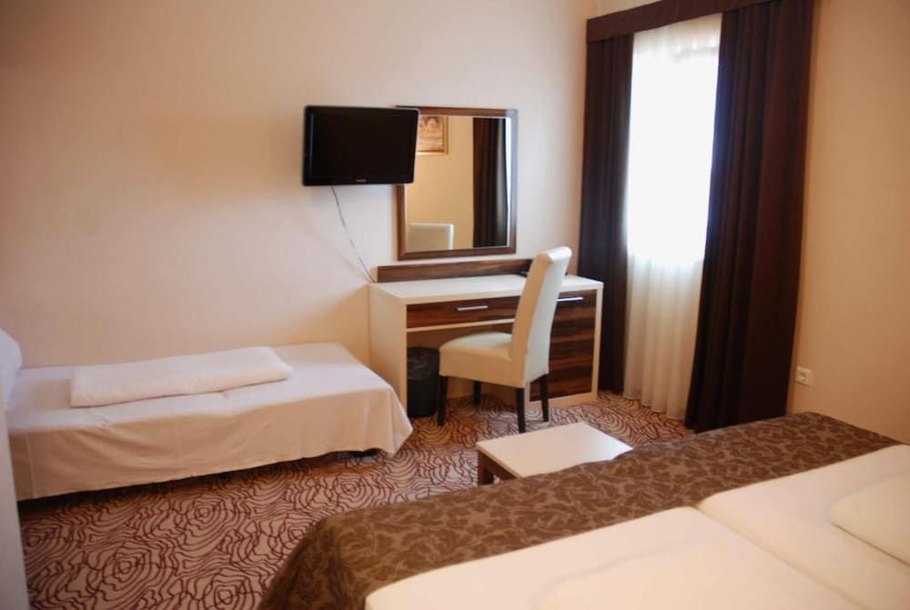 Exclusive Triple Room, Courtyard View