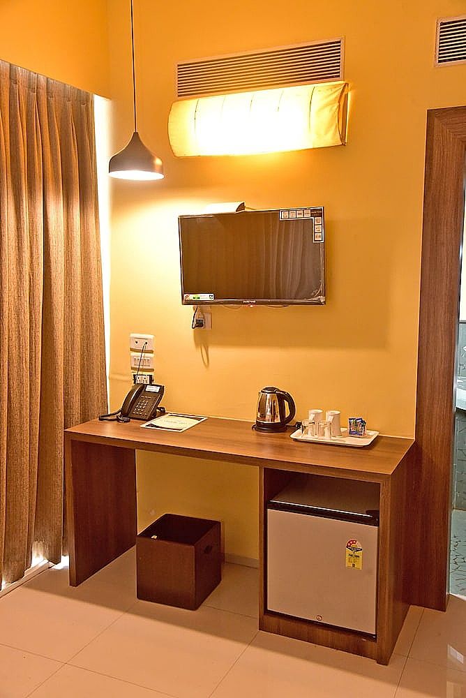 Sharanam Green Resort Deluxe Room 4