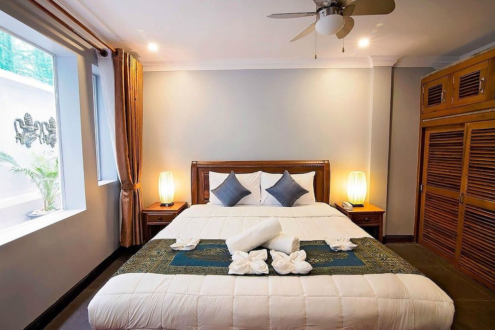 The Five Senses Boutique Hotel Deluxe King Room with Bathtub 7