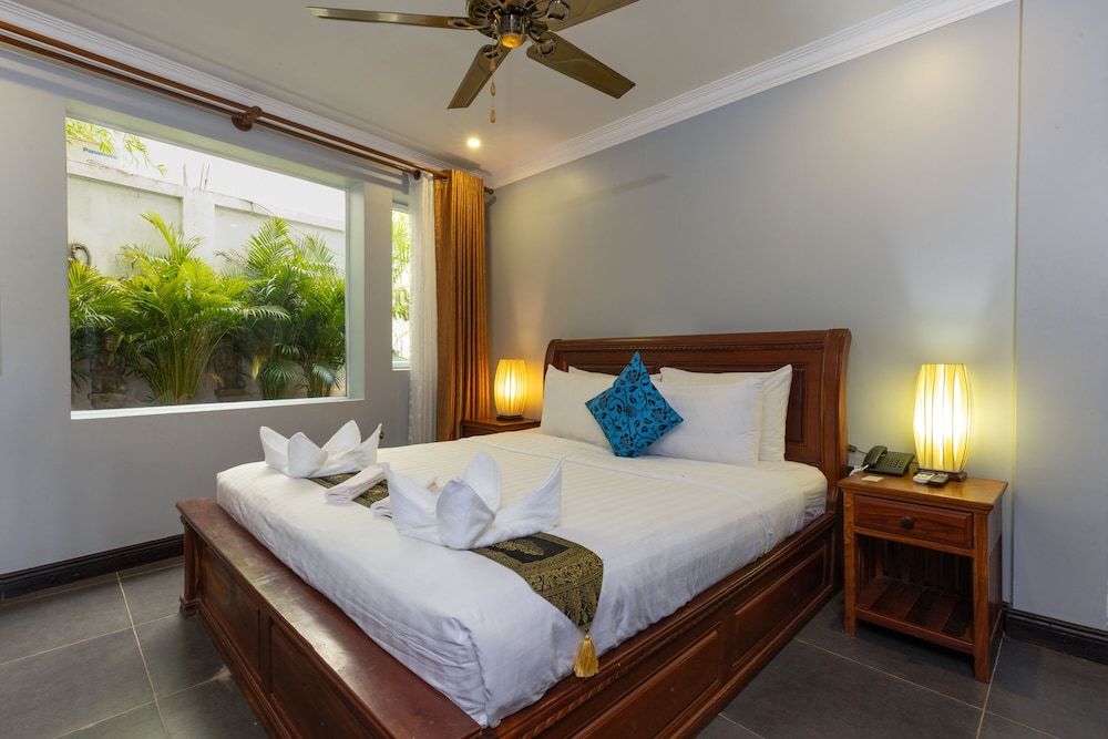 The Five Senses Boutique Hotel Deluxe King Room with Bathtub 5