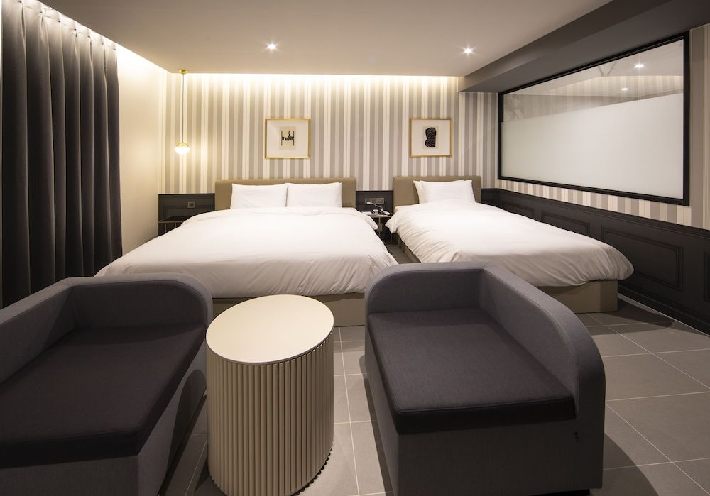 Brown Dot Hotel - Jangsaengpo Deluxe Family Twin, Ocean View 6