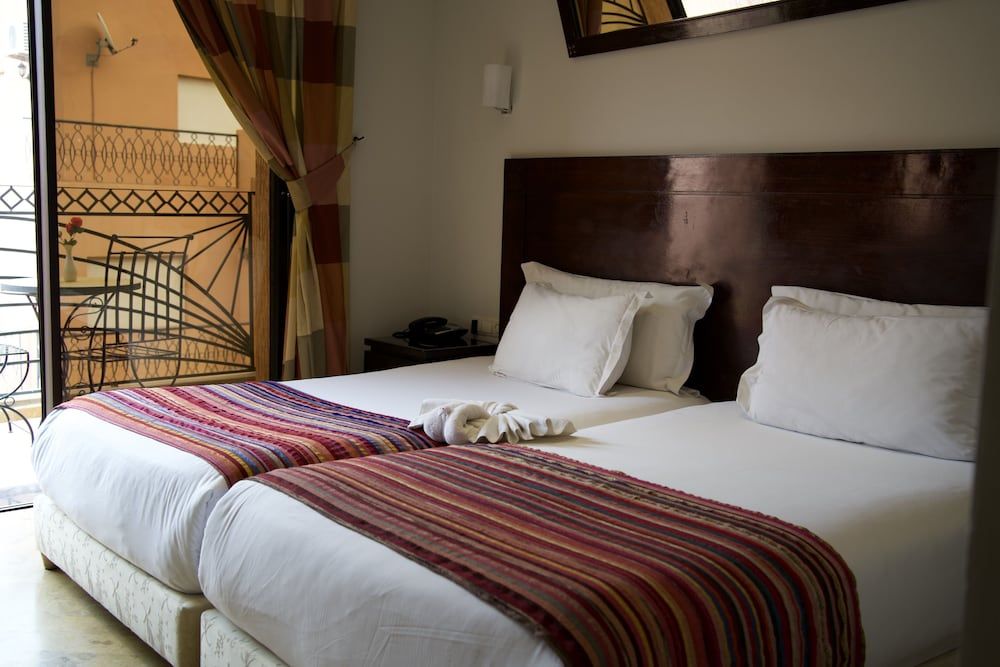 undefined Hôtel Les Trois Palmiers 10