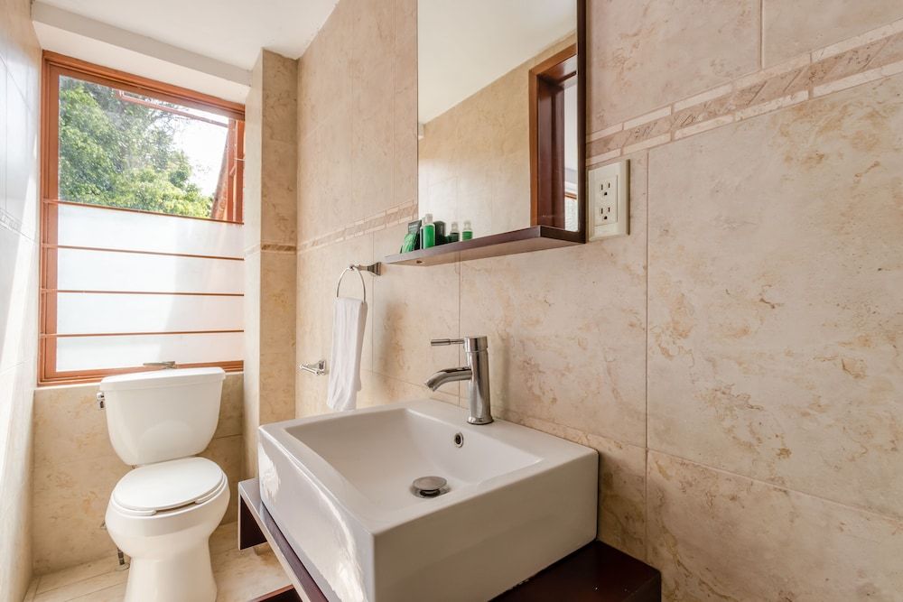 Ayenda Suites Cuija Standard Double Room 9