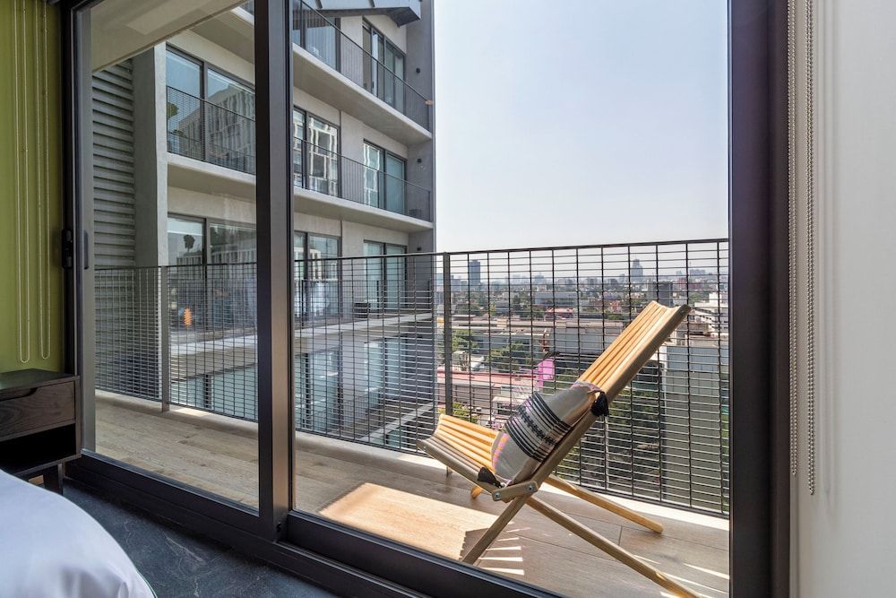 Taman by Kukun Grand Apartment, City View 13