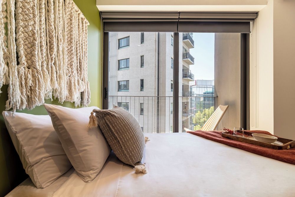 Taman by Kukun Grand Apartment, City View 16