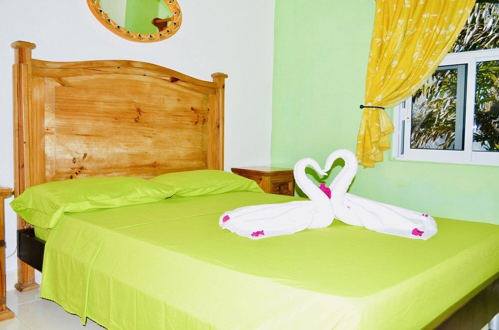 Room-deluxe Family Budget Balcony Room w Room, 2 Bedrooms, Balcony, Garden View 8