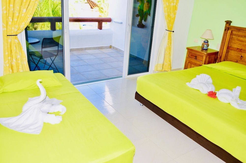 Room-deluxe Family Budget Balcony Room w Room, 2 Bedrooms, Balcony, Garden View 9