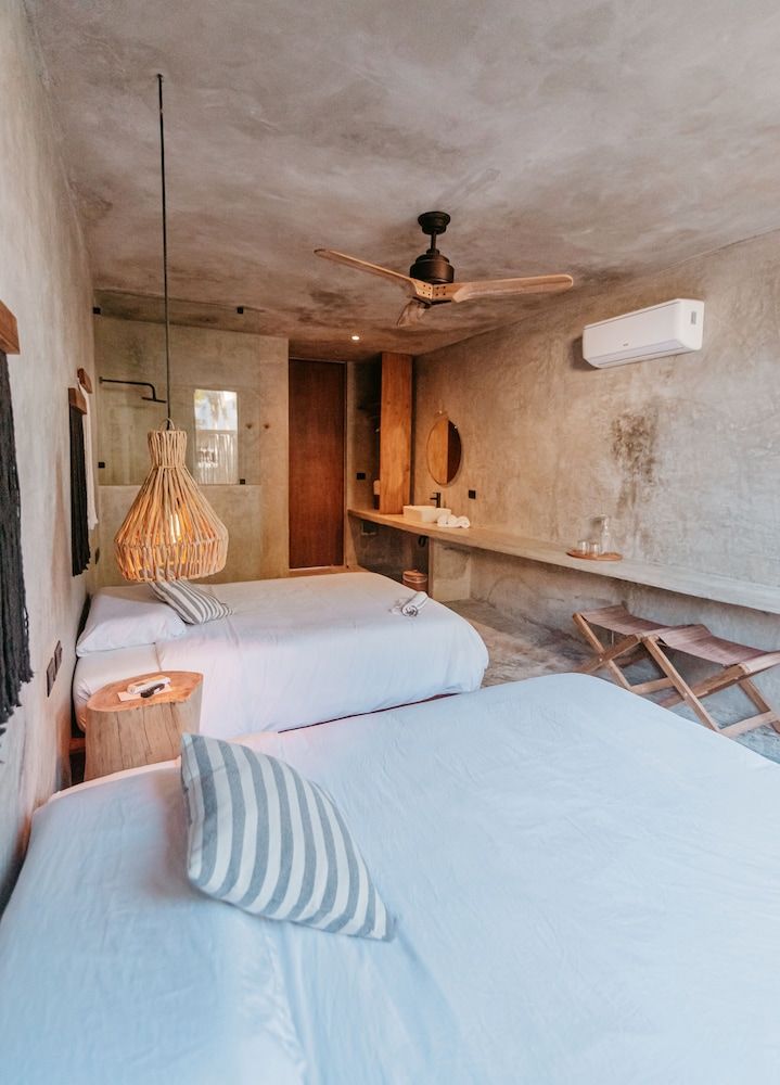 Dos Mares Barefoot Luxury Private Garden Double Beds 2