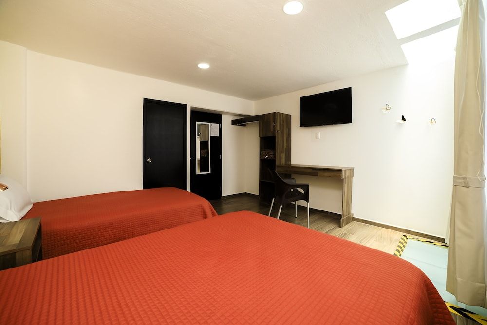 Capital O Hotel Boutique Las Torres Standard Triple Room